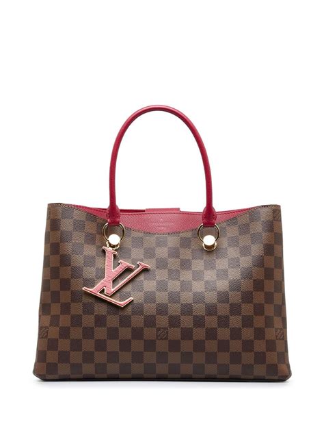 louis vuitton vs coach leather.